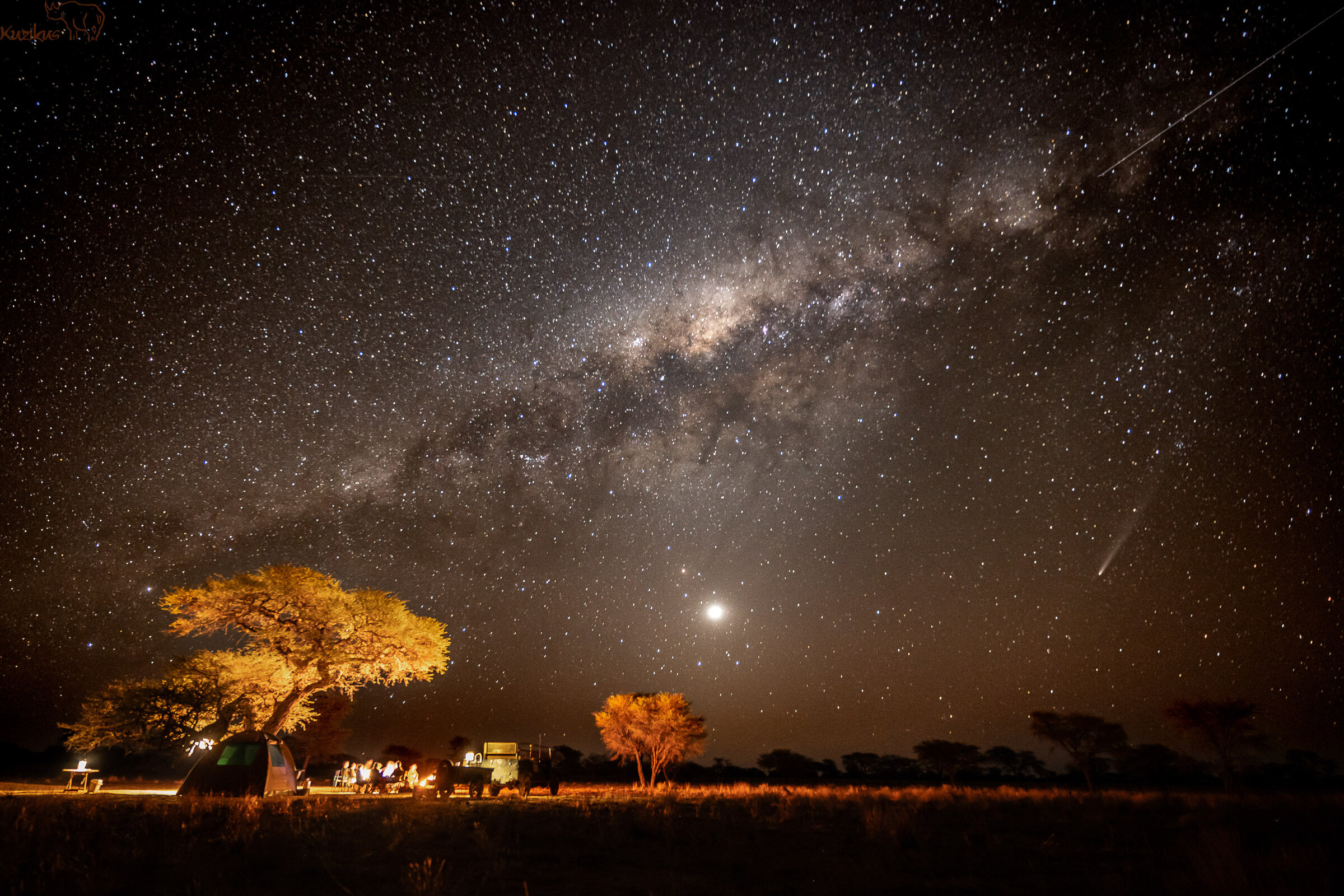 small tent set up under the kalahari nightsky 